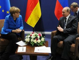 Миротворец Меркель в Париже Миротворец Меркель в Париже
